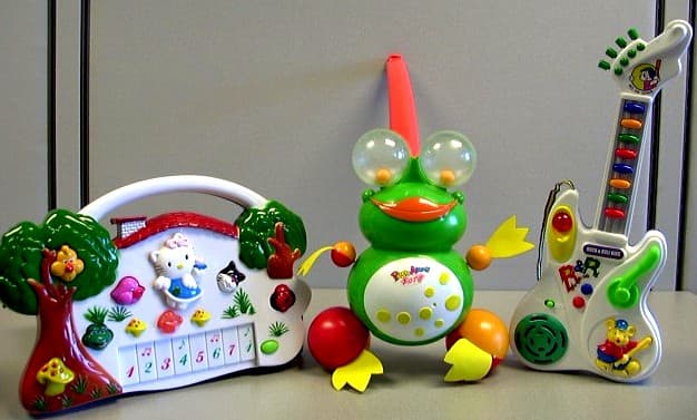 Push Along Frog, Animal Organ, and Rock & Roll Kids Guitar Toys - Image 1