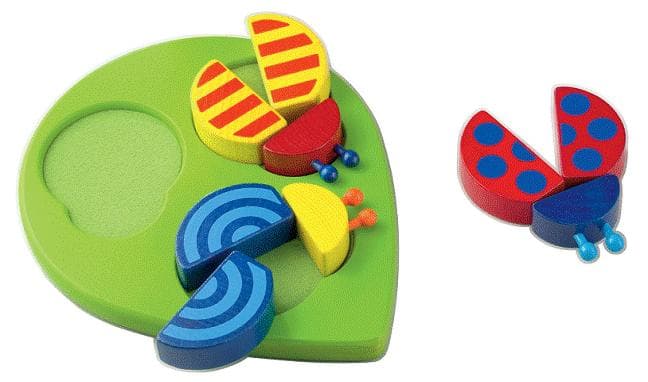 Wooden Puzzles, Infant Rattles, Pacifier Holders, and Stroller Toys - Image 1